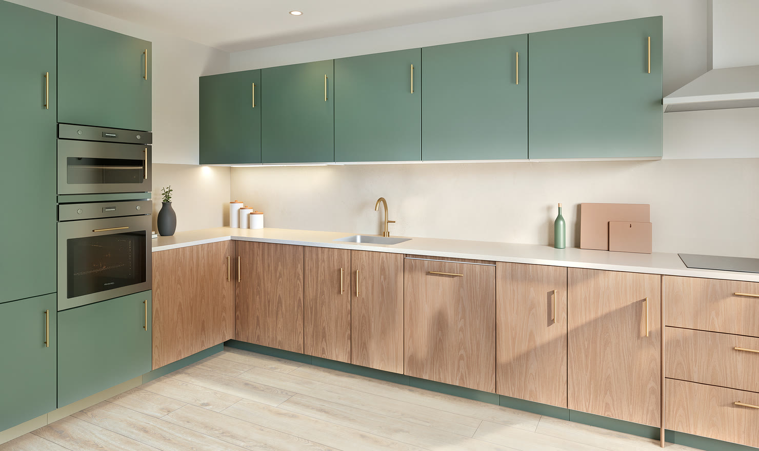 Forest green and oak L-shaped kitchen in afternoon sun